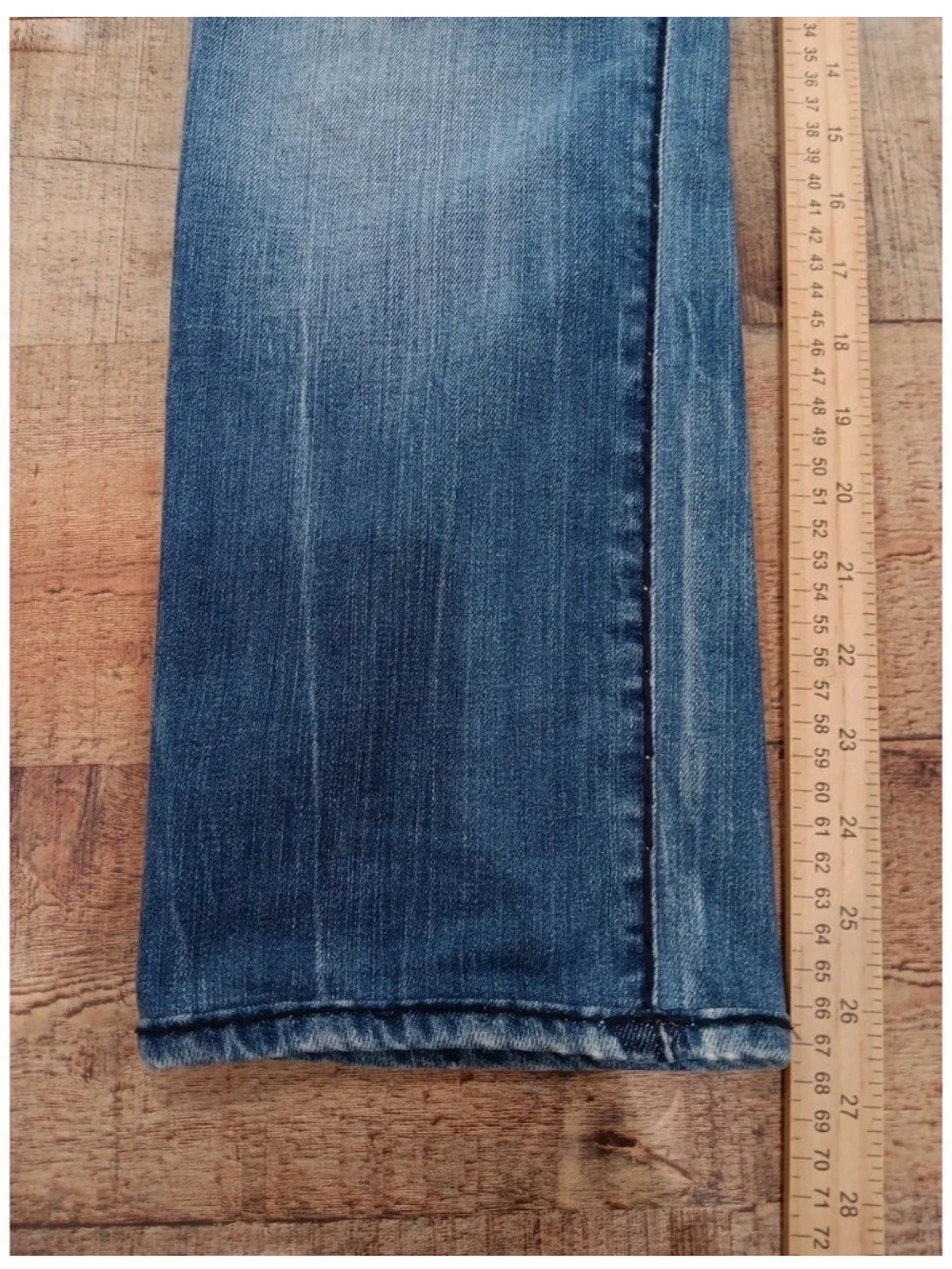 True Religion light blue jeans with red contrast stitching